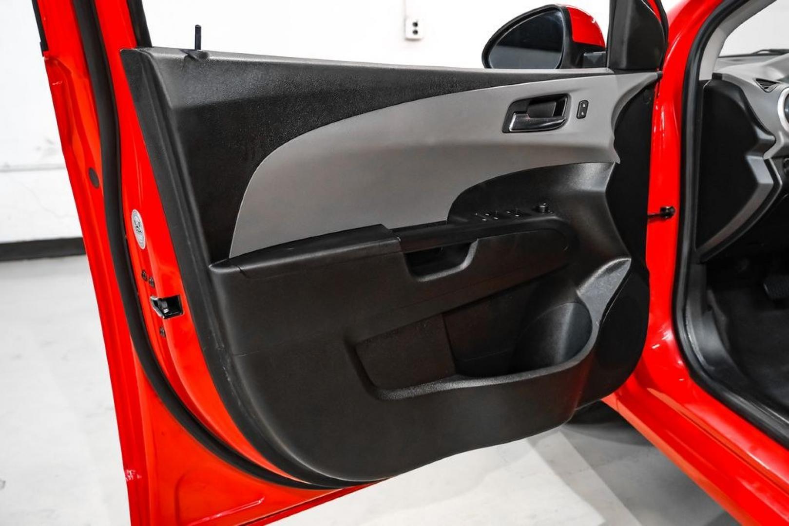 2018 Red /Jet Black/Dark Titanium Chevrolet Sonic LT (1G1JD5SH5J4) with an ECOTEC 1.8L I4 DOHC VVT engine, Automatic transmission, located at 15300 Midway Rd., Addison, TX, 75001, (972) 702-0011, 32.958321, -96.838074- Photo#38