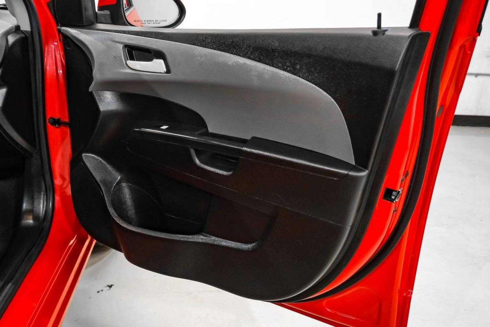 2018 Red /Jet Black/Dark Titanium Chevrolet Sonic LT (1G1JD5SH5J4) with an ECOTEC 1.8L I4 DOHC VVT engine, Automatic transmission, located at 15300 Midway Rd., Addison, TX, 75001, (972) 702-0011, 32.958321, -96.838074- Photo#40