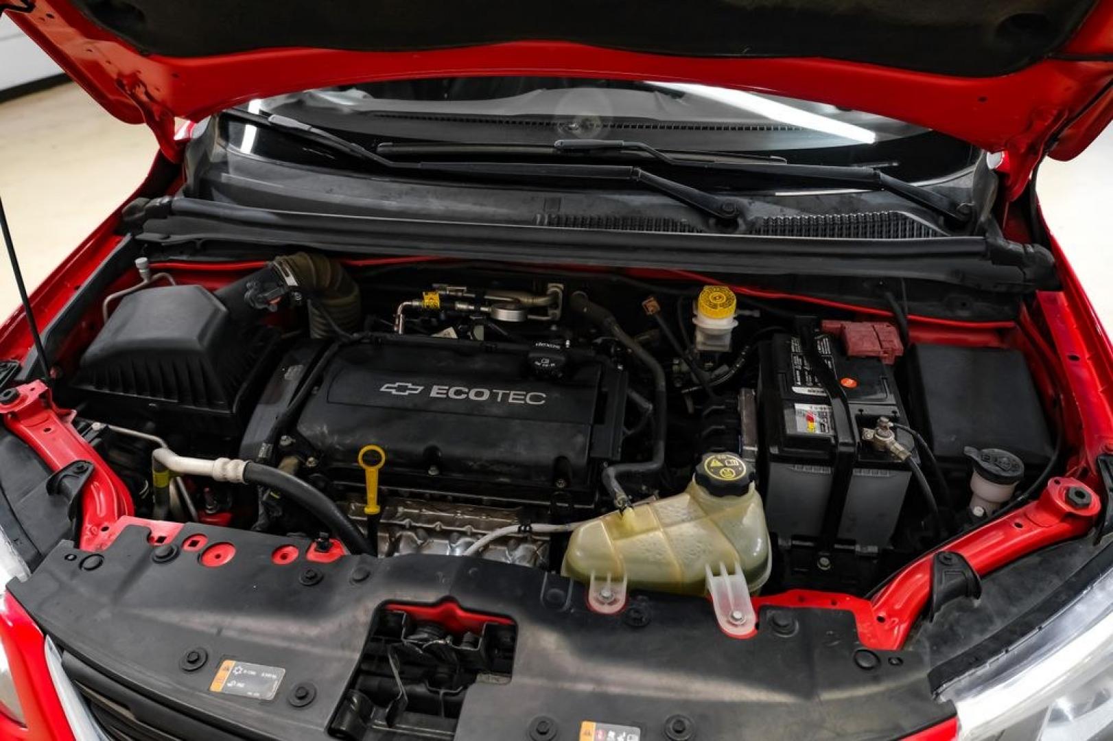 2018 Red /Jet Black/Dark Titanium Chevrolet Sonic LT (1G1JD5SH5J4) with an ECOTEC 1.8L I4 DOHC VVT engine, Automatic transmission, located at 15300 Midway Rd., Addison, TX, 75001, (972) 702-0011, 32.958321, -96.838074- Photo#45