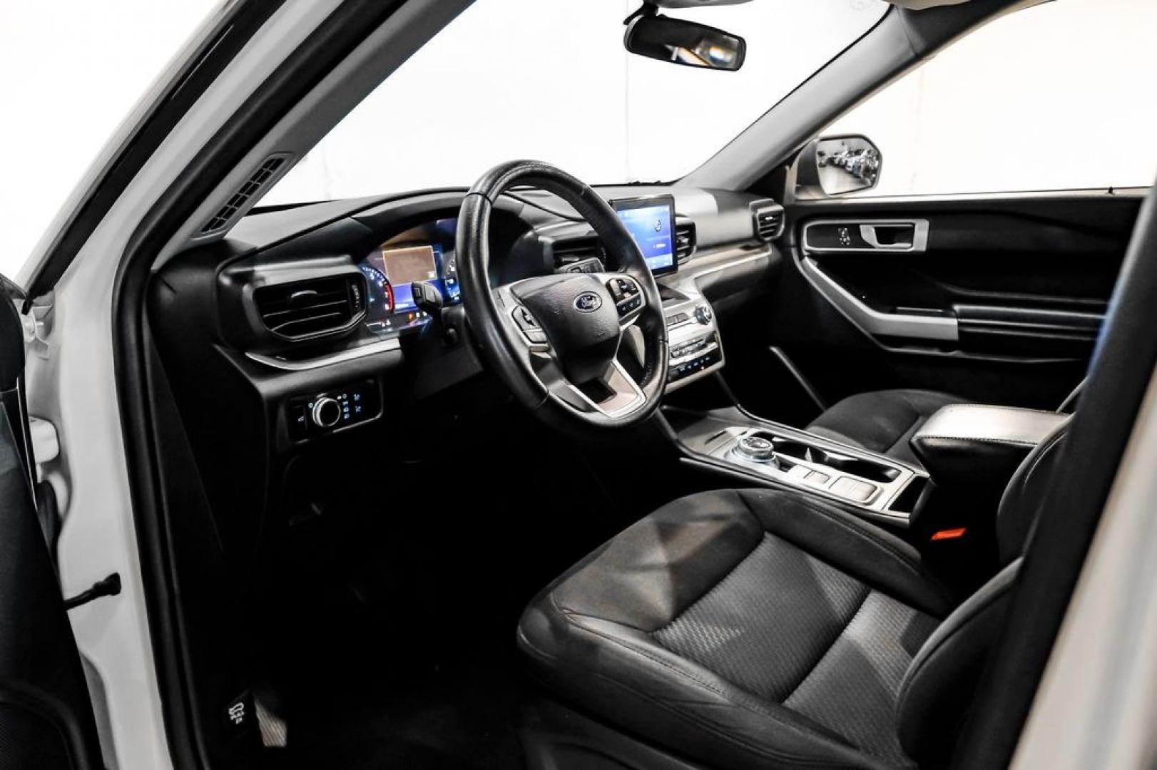 2023 White Metallic /Ebony Ford Explorer XLT (1FMSK7DHXPG) with an 2.3L EcoBoost I-4 engine, Automatic transmission, located at 15300 Midway Rd., Addison, TX, 75001, (972) 702-0011, 32.958321, -96.838074- Photo#2