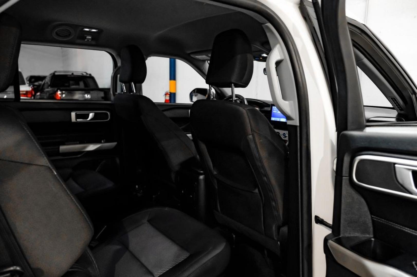 2023 White Metallic /Ebony Ford Explorer XLT (1FMSK7DHXPG) with an 2.3L EcoBoost I-4 engine, Automatic transmission, located at 15300 Midway Rd., Addison, TX, 75001, (972) 702-0011, 32.958321, -96.838074- Photo#34