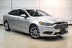 2017 Ingot Silver /Medium Light Stone Ford Fusion Hybrid SE (3FA6P0LU3HR) with an I4 Hybrid engine, CVT transmission, located at 15300 Midway Rd., Addison, TX, 75001, (972) 702-0011, 32.958321, -96.838074- Photo#4