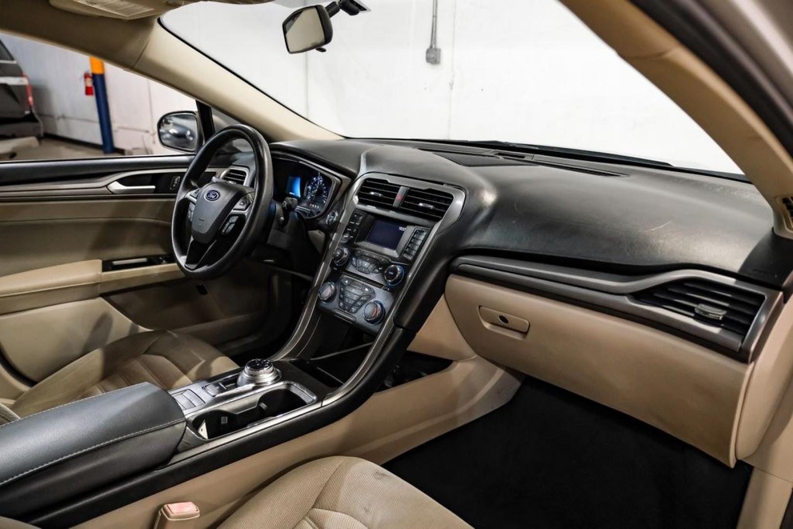 2017 Ingot Silver /Medium Light Stone Ford Fusion Hybrid SE (3FA6P0LU3HR) with an I4 Hybrid engine, CVT transmission, located at 15300 Midway Rd., Addison, TX, 75001, (972) 702-0011, 32.958321, -96.838074- Photo#10
