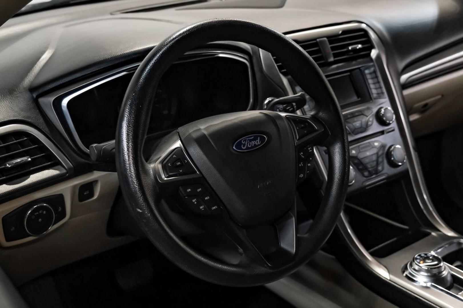 2017 Ingot Silver /Medium Light Stone Ford Fusion Hybrid SE (3FA6P0LU3HR) with an I4 Hybrid engine, CVT transmission, located at 15300 Midway Rd., Addison, TX, 75001, (972) 702-0011, 32.958321, -96.838074- Photo#13