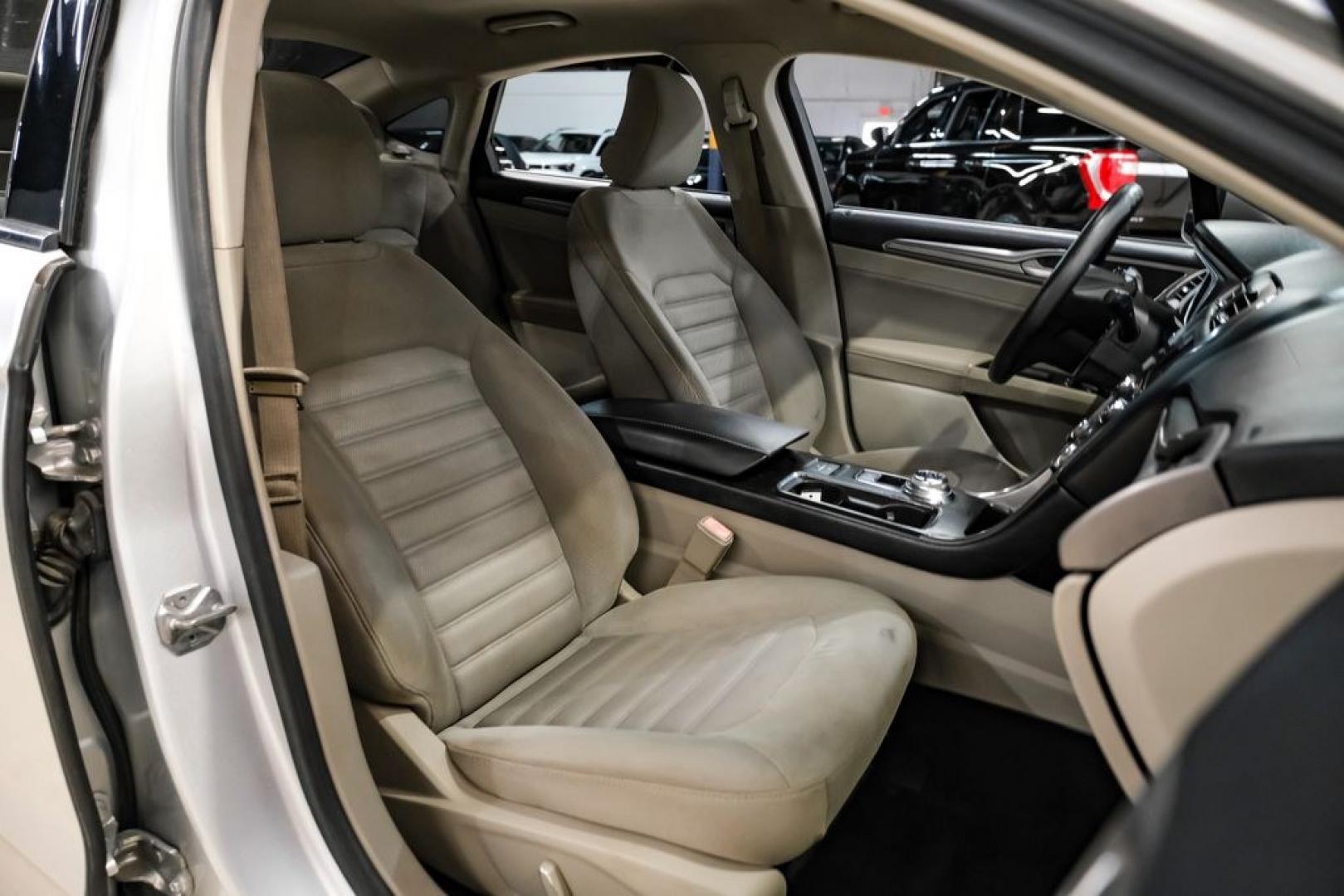 2017 Ingot Silver /Medium Light Stone Ford Fusion Hybrid SE (3FA6P0LU3HR) with an I4 Hybrid engine, CVT transmission, located at 15300 Midway Rd., Addison, TX, 75001, (972) 702-0011, 32.958321, -96.838074- Photo#31
