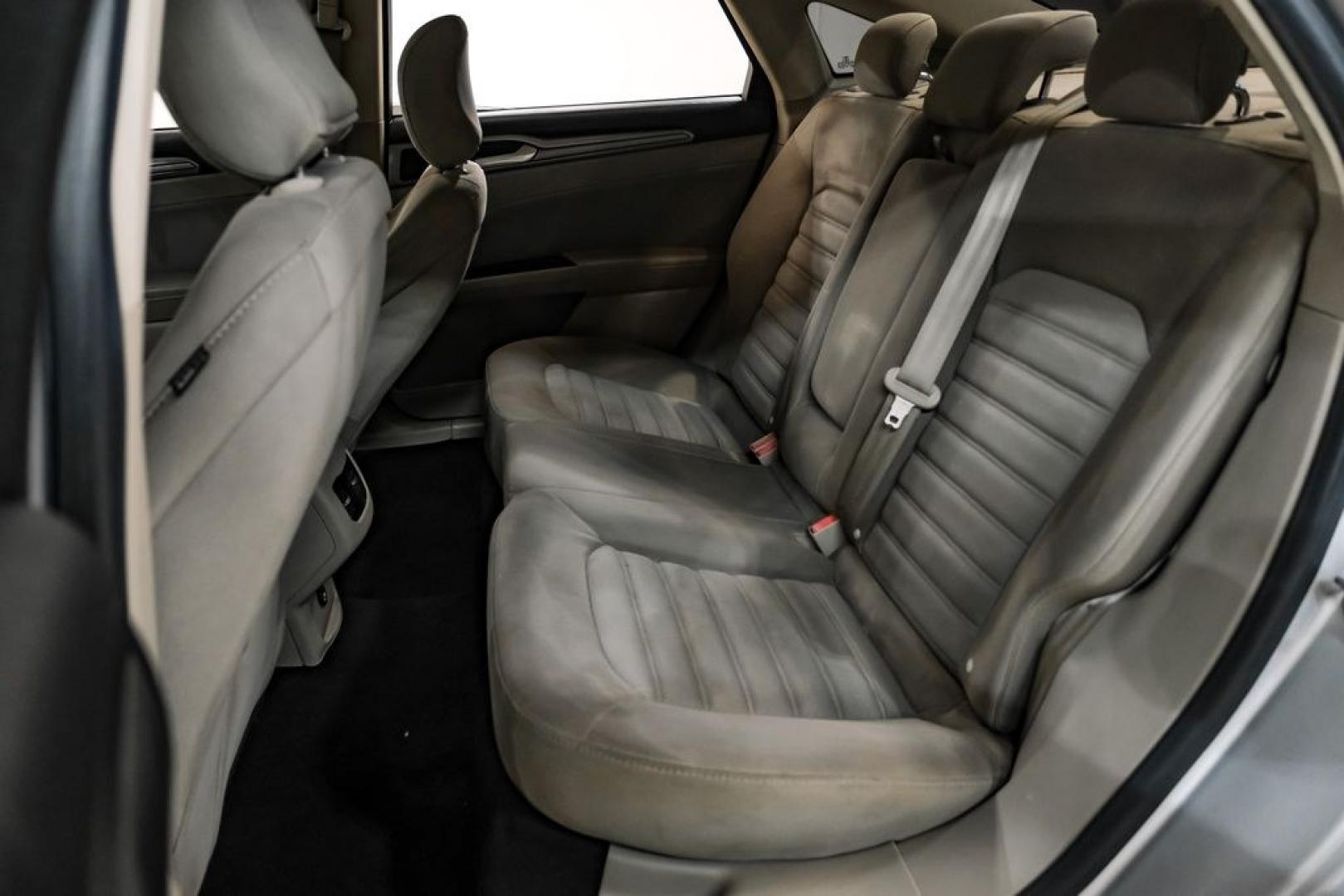 2017 Ingot Silver /Medium Light Stone Ford Fusion Hybrid SE (3FA6P0LU3HR) with an I4 Hybrid engine, CVT transmission, located at 15300 Midway Rd., Addison, TX, 75001, (972) 702-0011, 32.958321, -96.838074- Photo#35