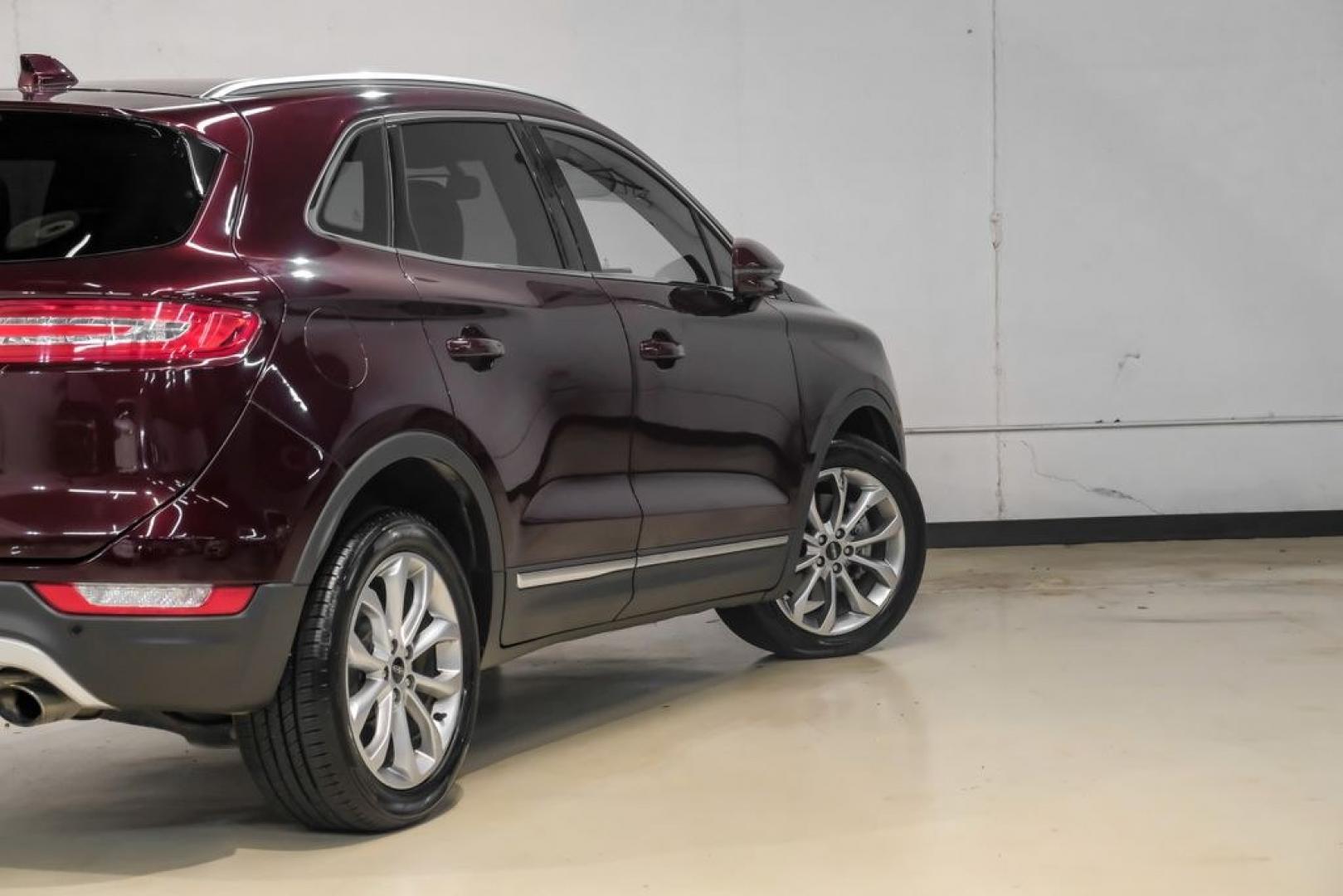 2019 Burgundy /Ebony Lincoln MKC Select (5LMCJ2C97KU) with an 2.0L I4 engine, Automatic transmission, located at 15300 Midway Rd., Addison, TX, 75001, (972) 702-0011, 32.958321, -96.838074- Photo#12
