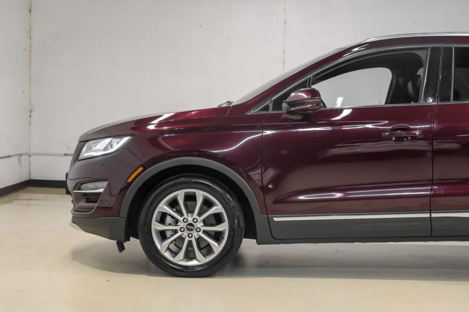 2019 Burgundy /Ebony Lincoln MKC Select (5LMCJ2C97KU) with an 2.0L I4 engine, Automatic transmission, located at 15300 Midway Rd., Addison, TX, 75001, (972) 702-0011, 32.958321, -96.838074- Photo#16