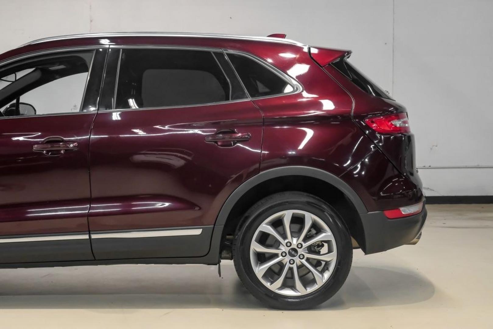 2019 Burgundy /Ebony Lincoln MKC Select (5LMCJ2C97KU) with an 2.0L I4 engine, Automatic transmission, located at 15300 Midway Rd., Addison, TX, 75001, (972) 702-0011, 32.958321, -96.838074- Photo#17