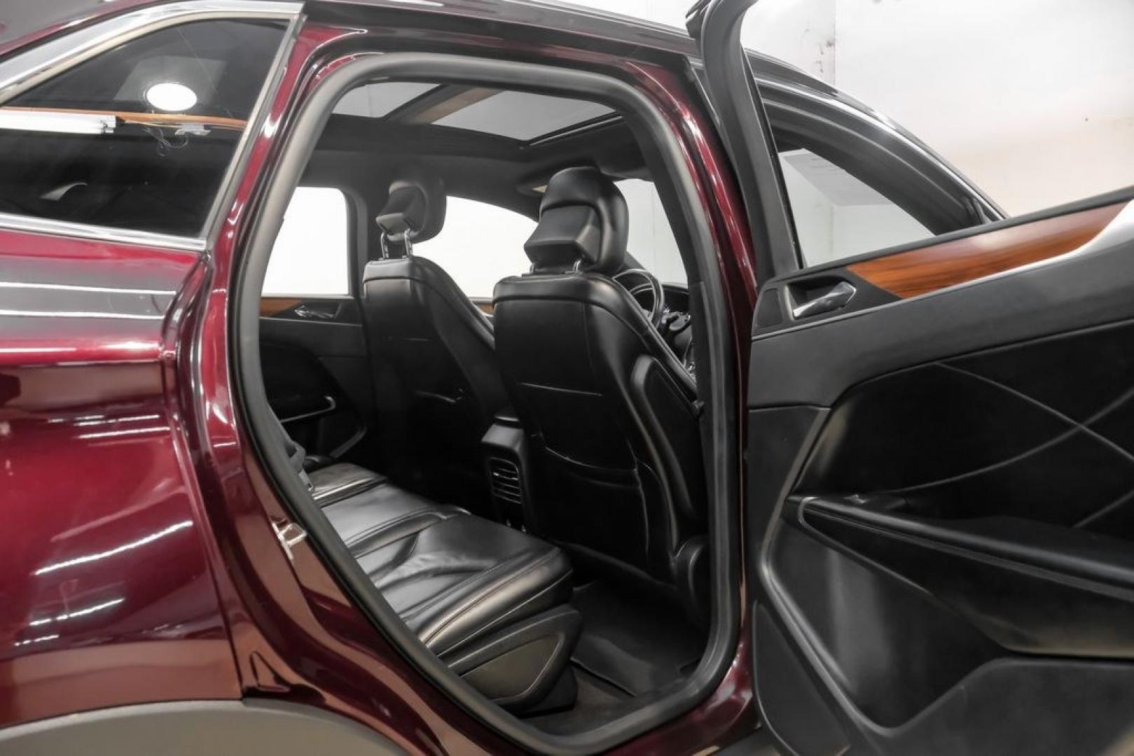 2019 Burgundy /Ebony Lincoln MKC Select (5LMCJ2C97KU) with an 2.0L I4 engine, Automatic transmission, located at 15300 Midway Rd., Addison, TX, 75001, (972) 702-0011, 32.958321, -96.838074- Photo#45
