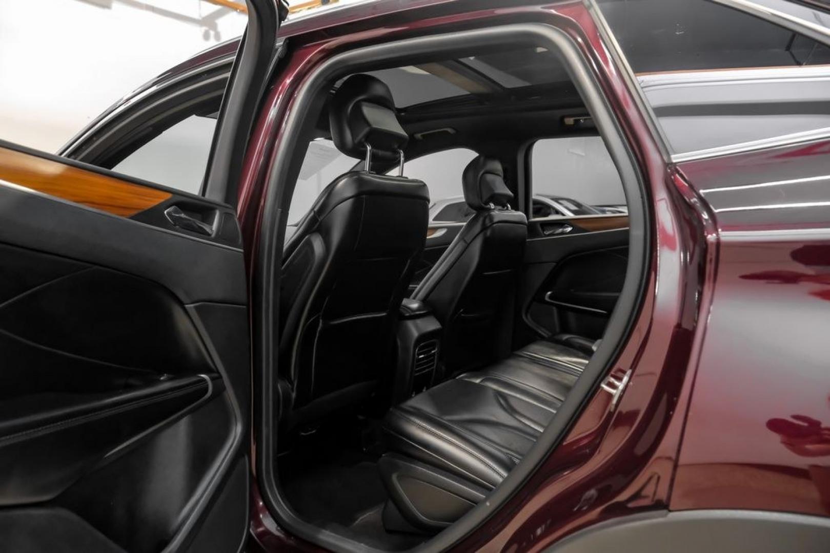 2019 Burgundy /Ebony Lincoln MKC Select (5LMCJ2C97KU) with an 2.0L I4 engine, Automatic transmission, located at 15300 Midway Rd., Addison, TX, 75001, (972) 702-0011, 32.958321, -96.838074- Photo#47