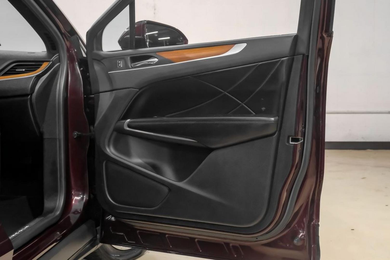 2019 Burgundy /Ebony Lincoln MKC Select (5LMCJ2C97KU) with an 2.0L I4 engine, Automatic transmission, located at 15300 Midway Rd., Addison, TX, 75001, (972) 702-0011, 32.958321, -96.838074- Photo#55