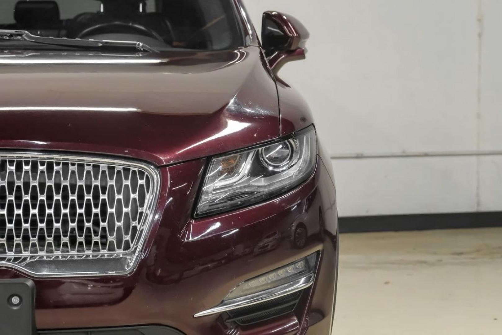 2019 Burgundy /Ebony Lincoln MKC Select (5LMCJ2C97KU) with an 2.0L I4 engine, Automatic transmission, located at 15300 Midway Rd., Addison, TX, 75001, (972) 702-0011, 32.958321, -96.838074- Photo#58