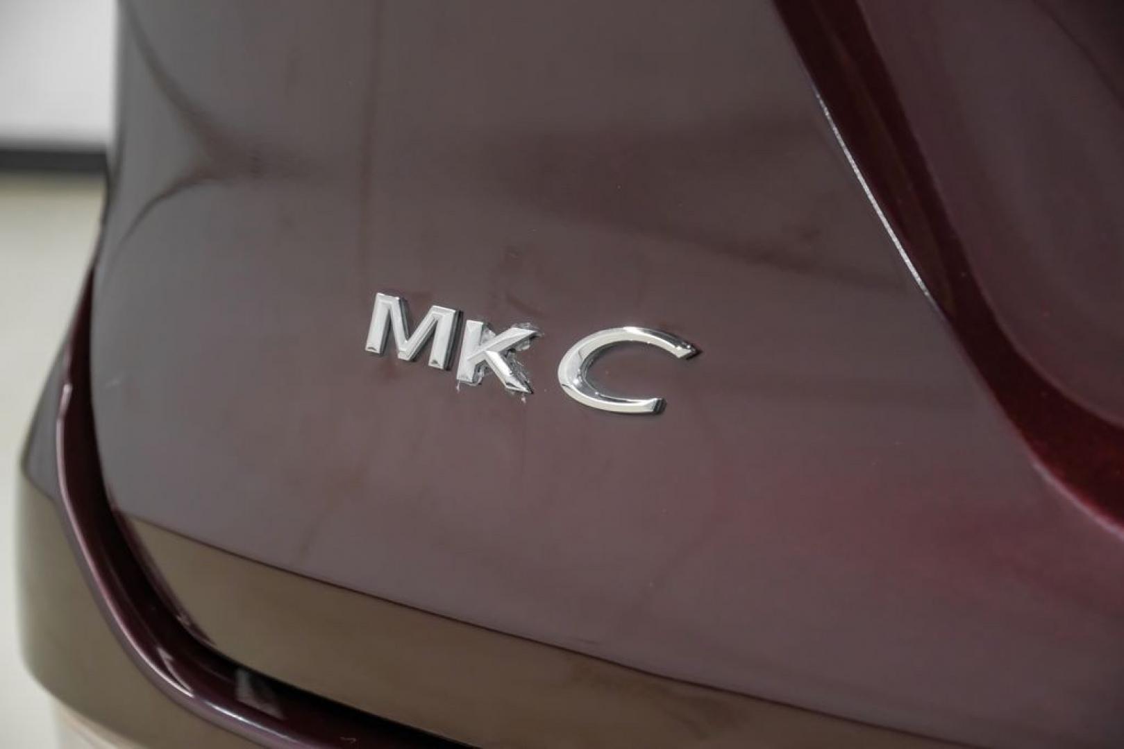 2019 Burgundy /Ebony Lincoln MKC Select (5LMCJ2C97KU) with an 2.0L I4 engine, Automatic transmission, located at 15300 Midway Rd., Addison, TX, 75001, (972) 702-0011, 32.958321, -96.838074- Photo#60