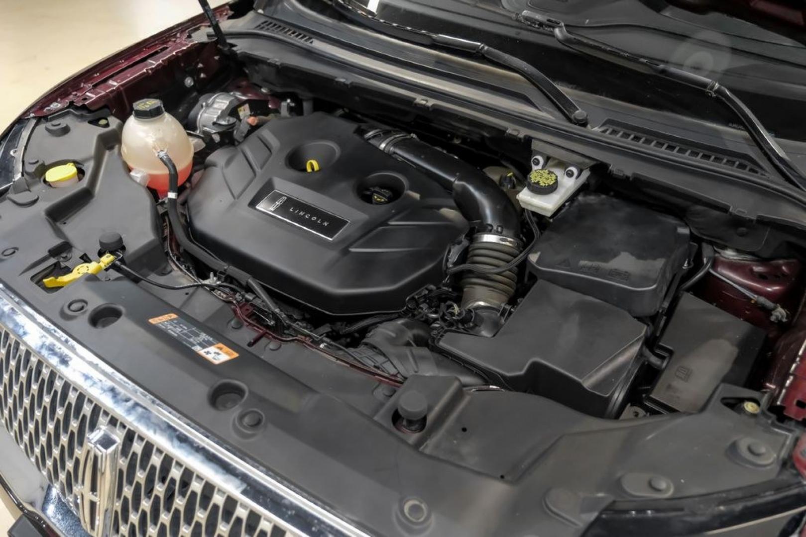2019 Burgundy /Ebony Lincoln MKC Select (5LMCJ2C97KU) with an 2.0L I4 engine, Automatic transmission, located at 15300 Midway Rd., Addison, TX, 75001, (972) 702-0011, 32.958321, -96.838074- Photo#61