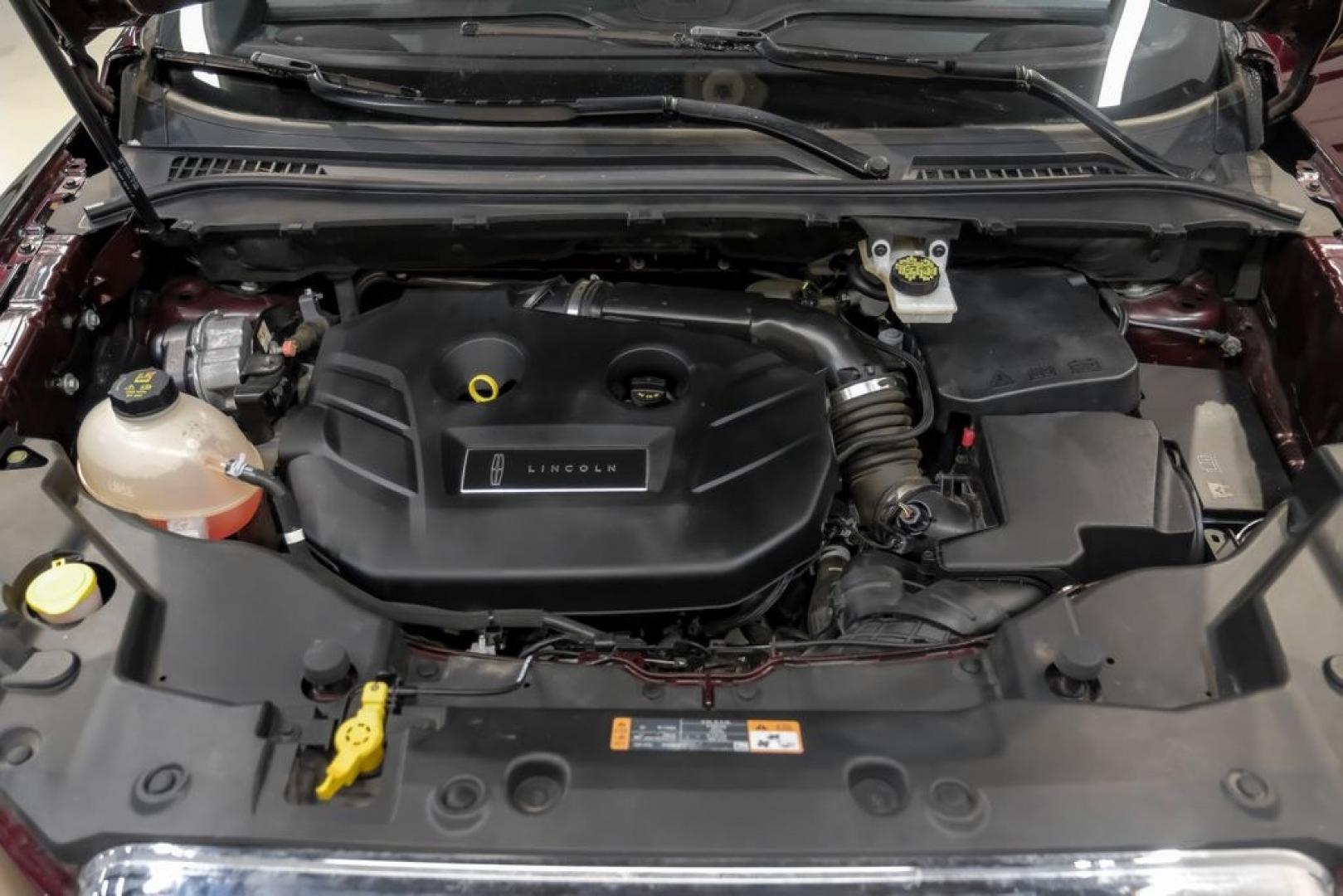 2019 Burgundy /Ebony Lincoln MKC Select (5LMCJ2C97KU) with an 2.0L I4 engine, Automatic transmission, located at 15300 Midway Rd., Addison, TX, 75001, (972) 702-0011, 32.958321, -96.838074- Photo#62