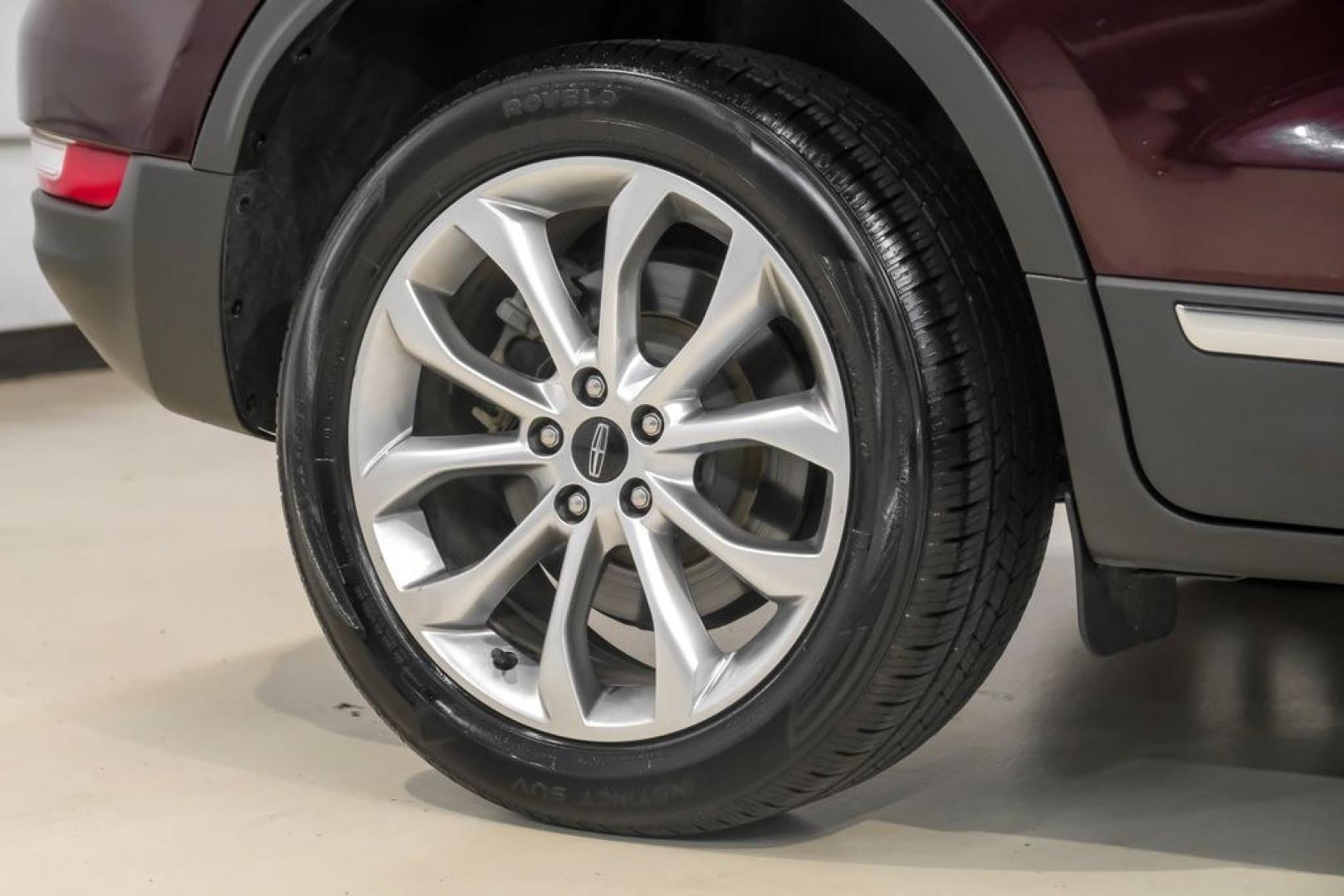 2019 Burgundy /Ebony Lincoln MKC Select (5LMCJ2C97KU) with an 2.0L I4 engine, Automatic transmission, located at 15300 Midway Rd., Addison, TX, 75001, (972) 702-0011, 32.958321, -96.838074- Photo#66