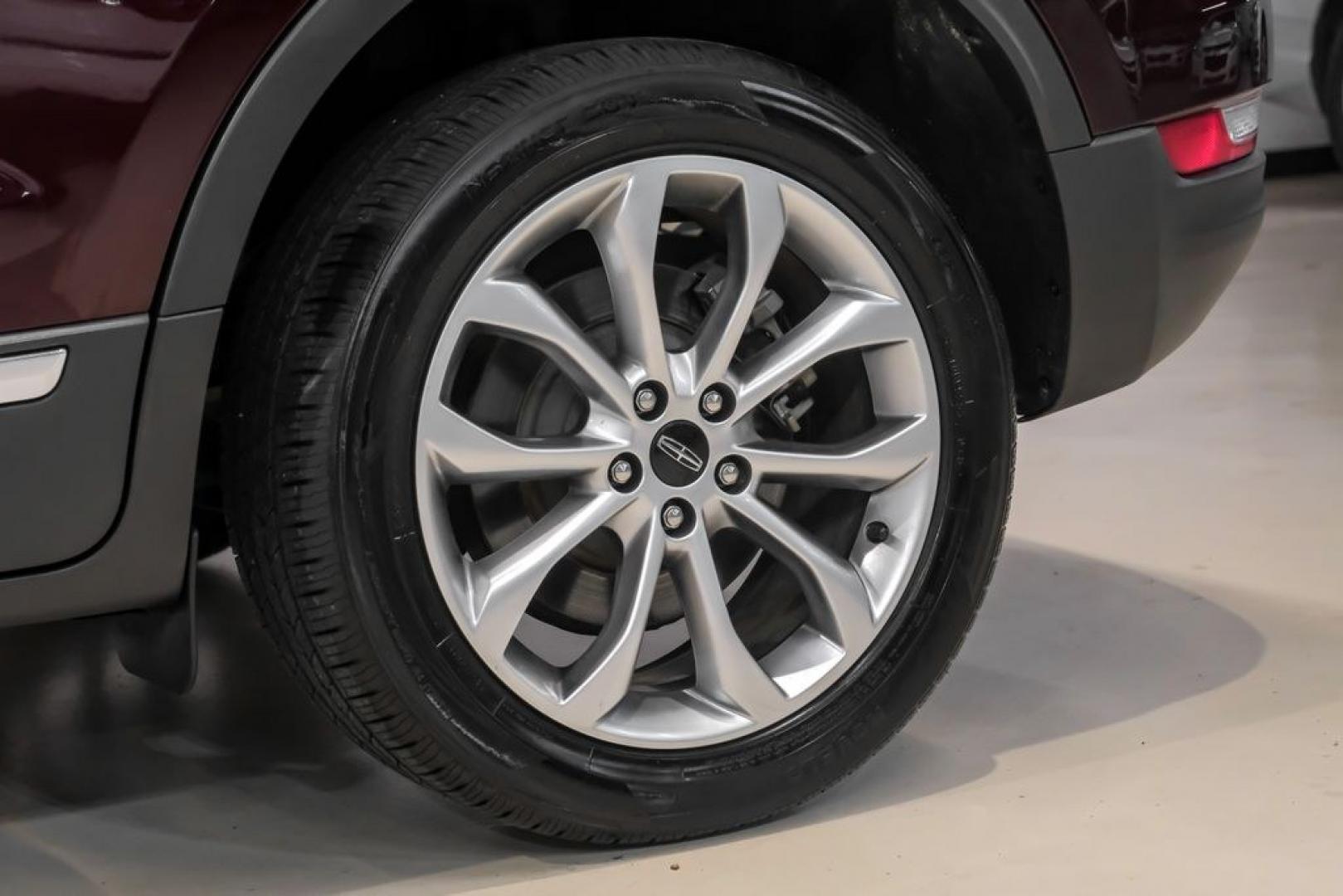 2019 Burgundy /Ebony Lincoln MKC Select (5LMCJ2C97KU) with an 2.0L I4 engine, Automatic transmission, located at 15300 Midway Rd., Addison, TX, 75001, (972) 702-0011, 32.958321, -96.838074- Photo#69