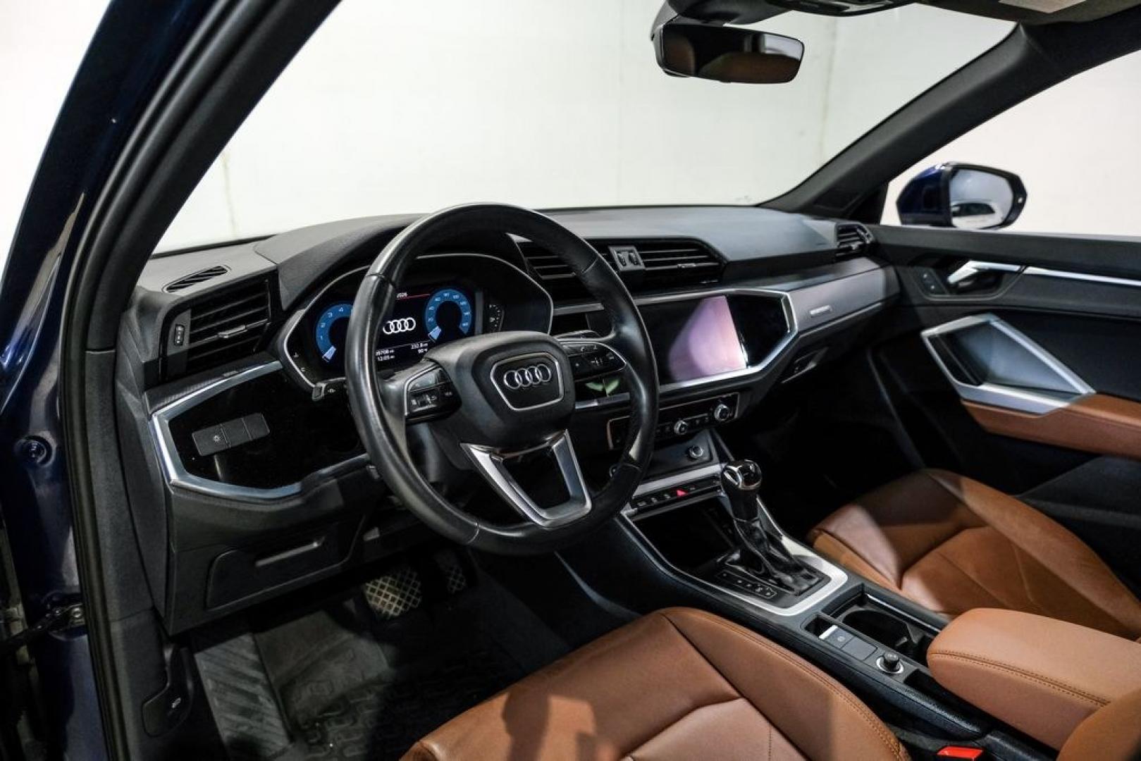 2022 Navarra Blue Metallic /Okapi Brown Audi Q3 Premium (WA1DECF31N1) with an 2.0L 4-Cylinder TFSI engine, Automatic transmission, located at 15300 Midway Rd., Addison, TX, 75001, (972) 702-0011, 32.958321, -96.838074- Photo#2