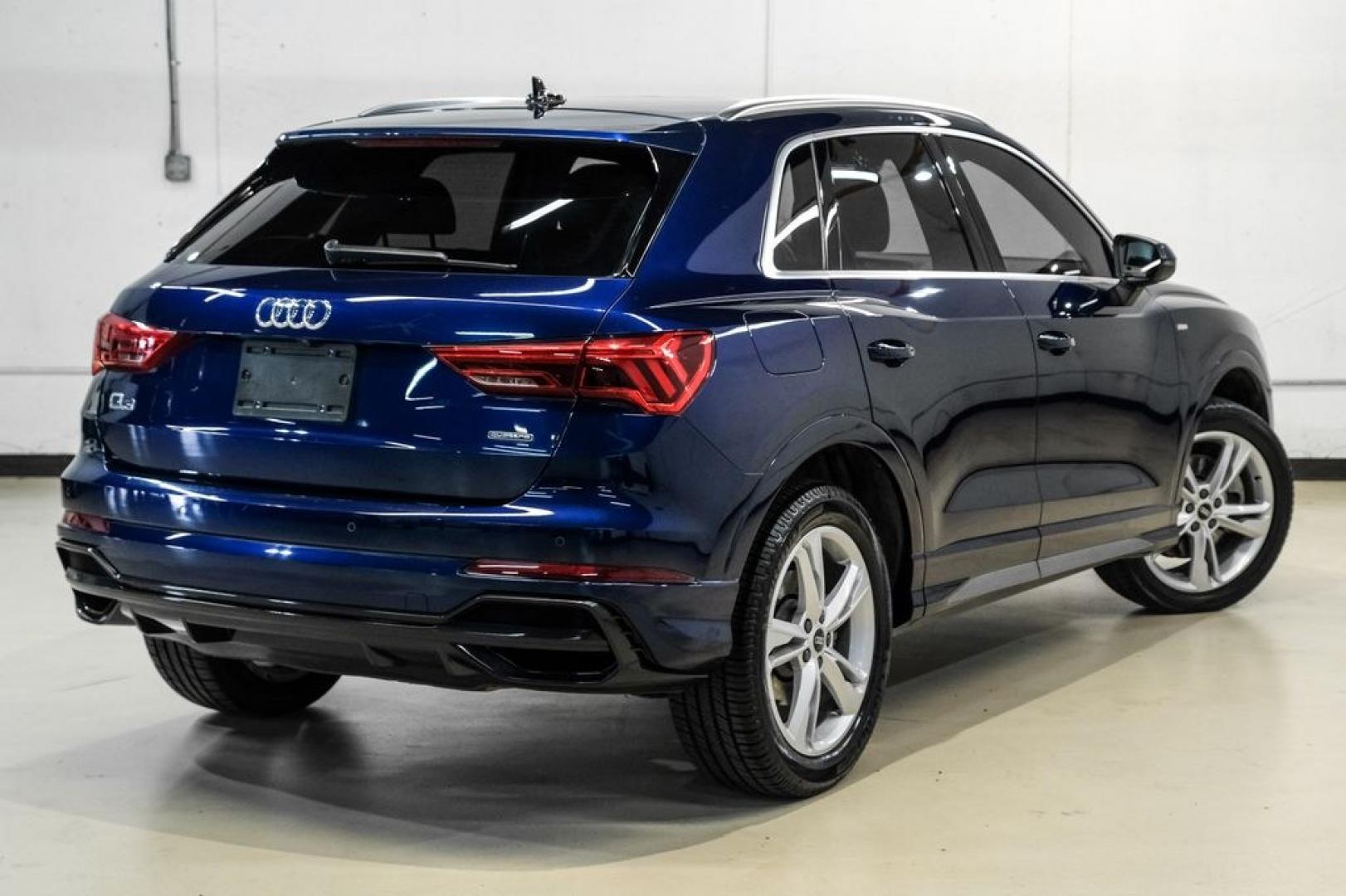 2022 Navarra Blue Metallic /Okapi Brown Audi Q3 Premium (WA1DECF31N1) with an 2.0L 4-Cylinder TFSI engine, Automatic transmission, located at 15300 Midway Rd., Addison, TX, 75001, (972) 702-0011, 32.958321, -96.838074- Photo#8