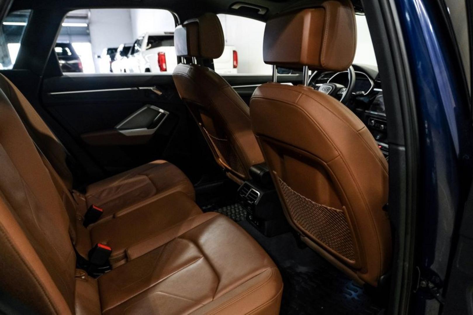 2022 Navarra Blue Metallic /Okapi Brown Audi Q3 Premium (WA1DECF31N1) with an 2.0L 4-Cylinder TFSI engine, Automatic transmission, located at 15300 Midway Rd., Addison, TX, 75001, (972) 702-0011, 32.958321, -96.838074- Photo#31