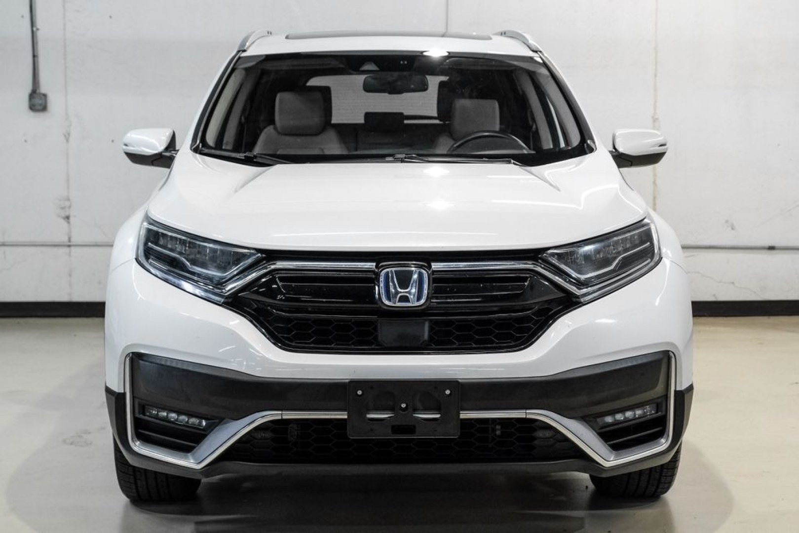 2021 Platinum White Pearl /Ivory Honda CR-V Hybrid Touring (7FART6H9XME) with an 2.0L I4 DOHC 16V engine, CVT transmission, located at 15300 Midway Rd., Addison, TX, 75001, (972) 702-0011, 32.958321, -96.838074- Photo#5