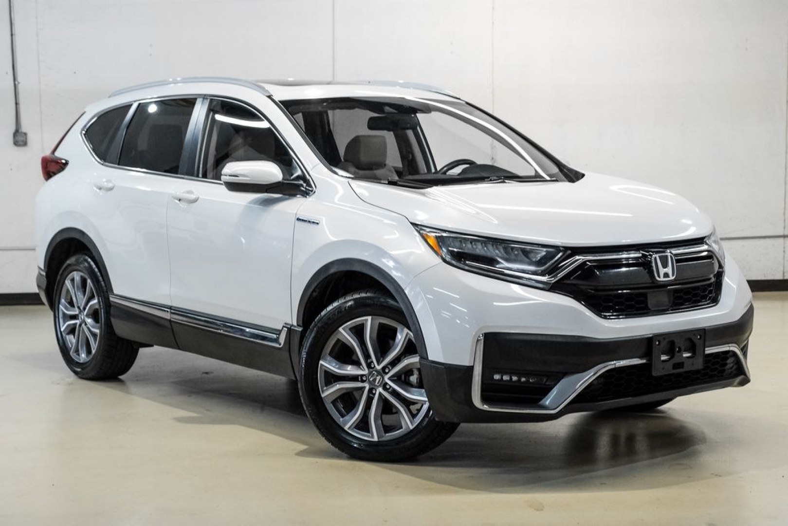 2021 Platinum White Pearl /Ivory Honda CR-V Hybrid Touring (7FART6H9XME) with an 2.0L I4 DOHC 16V engine, CVT transmission, located at 15300 Midway Rd., Addison, TX, 75001, (972) 702-0011, 32.958321, -96.838074- Photo#6