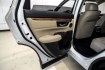 2021 Platinum White Pearl /Ivory Honda CR-V Hybrid Touring (7FART6H9XME) with an 2.0L I4 DOHC 16V engine, CVT transmission, located at 15300 Midway Rd., Addison, TX, 75001, (972) 702-0011, 32.958321, -96.838074- Photo#45