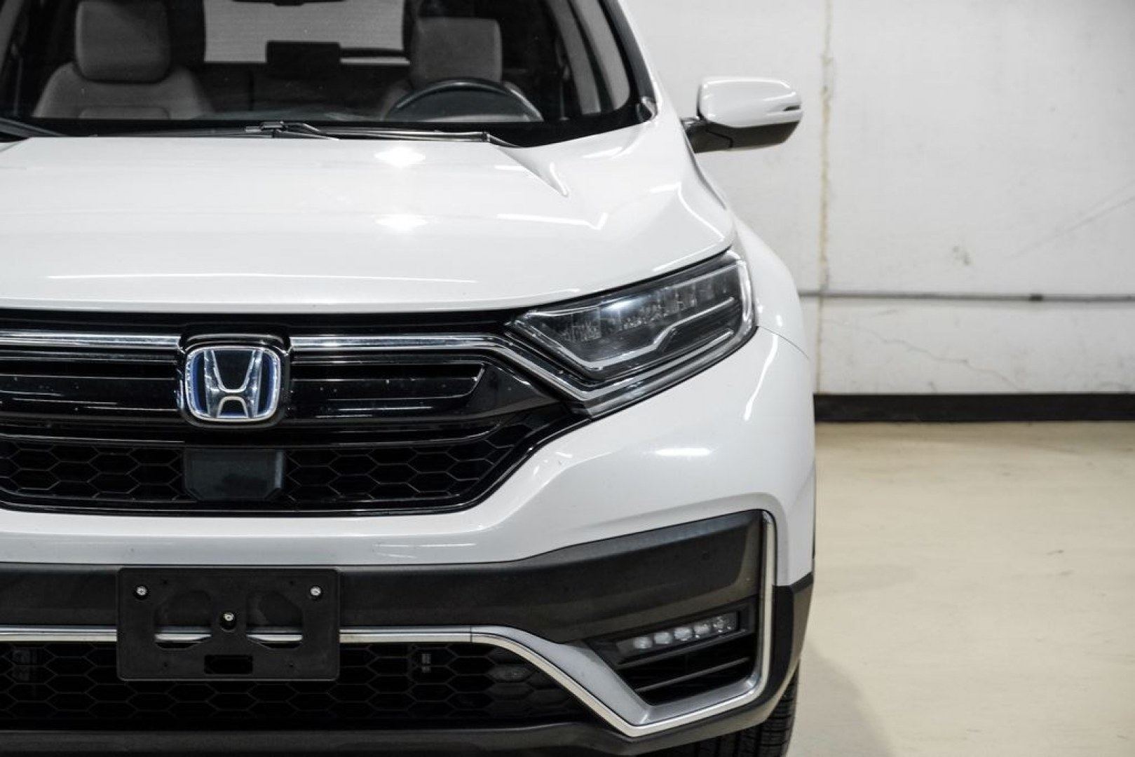 2021 Platinum White Pearl /Ivory Honda CR-V Hybrid Touring (7FART6H9XME) with an 2.0L I4 DOHC 16V engine, CVT transmission, located at 15300 Midway Rd., Addison, TX, 75001, (972) 702-0011, 32.958321, -96.838074- Photo#47