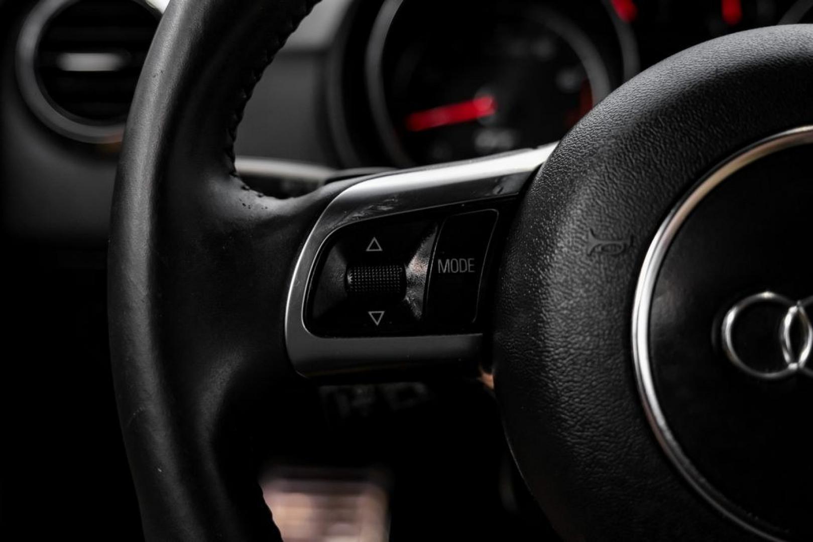 2013 Brilliant Black /Beige Audi TT 2.0T Prestige (TRUKFAFK9D1) with an 2.0L 4-Cylinder TFSI Turbocharged engine, Automatic transmission, located at 15300 Midway Rd., Addison, TX, 75001, (972) 702-0011, 32.958321, -96.838074- Photo#13