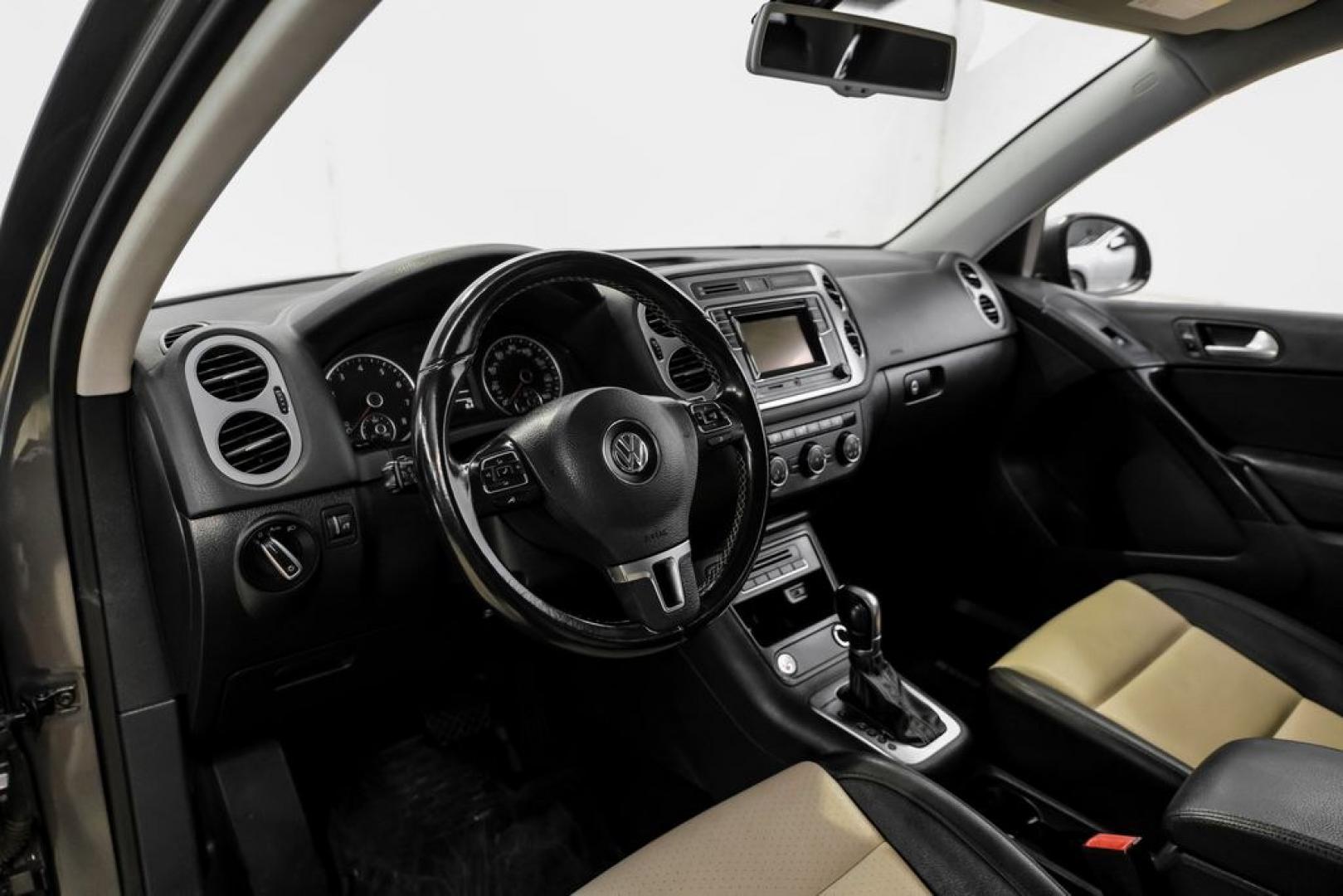 2016 Pepper / Gray /Two-Tone Beige/Black Volkswagen Tiguan S (WVGBV7AX0GW) with an 2.0L 4-Cylinder Turbocharged engine, Automatic transmission, located at 15300 Midway Rd., Addison, TX, 75001, (972) 702-0011, 32.958321, -96.838074- Photo#2