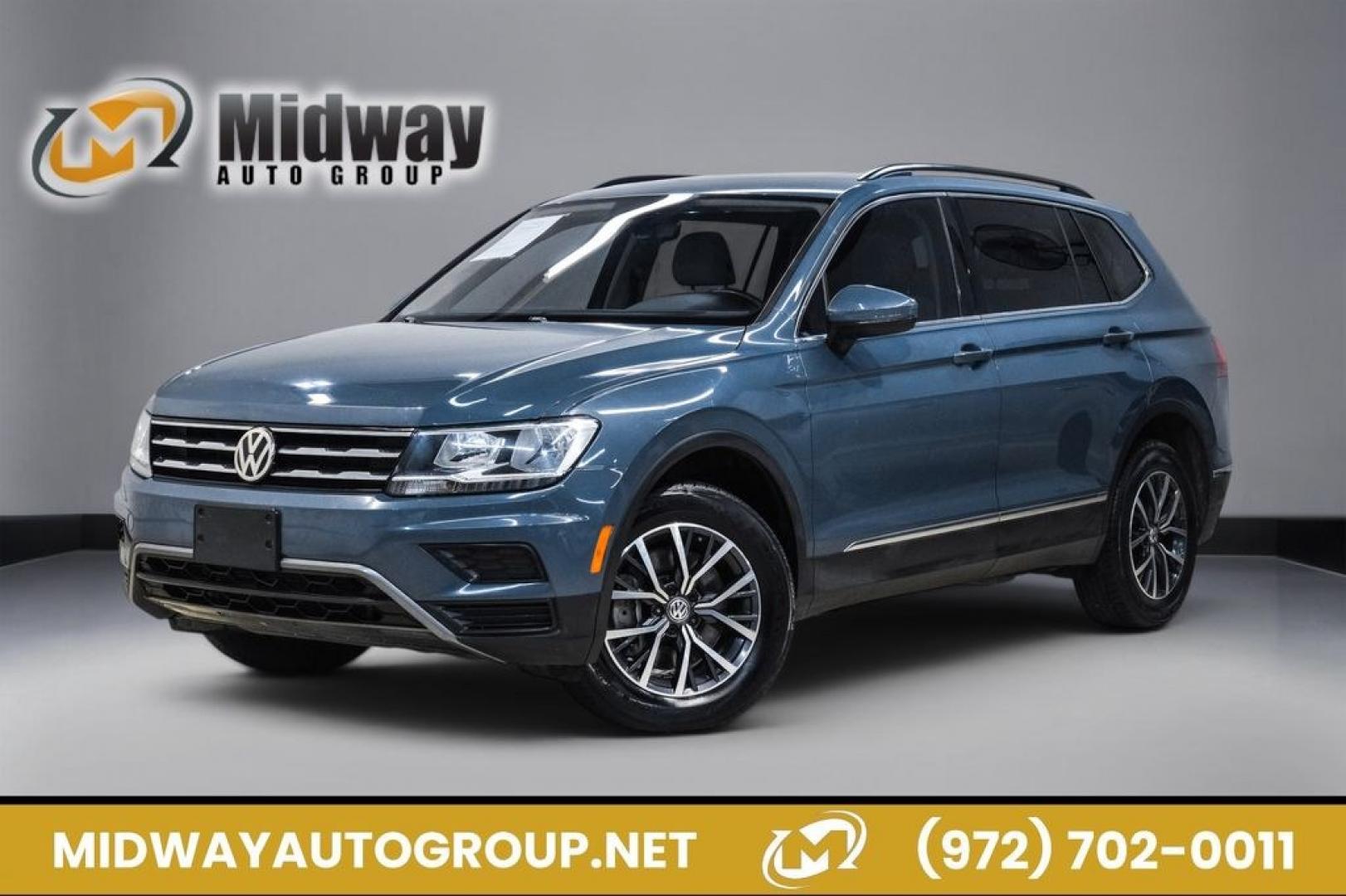 2020 Blue Metallic /Storm Gray Volkswagen Tiguan 2.0T SE (3VV3B7AX0LM) with an 2.0L TSI DOHC engine, Automatic transmission, located at 15300 Midway Rd., Addison, TX, 75001, (972) 702-0011, 32.958321, -96.838074- Photo#0