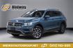 2020 Blue Metallic /Storm Gray Volkswagen Tiguan 2.0T SE (3VV3B7AX0LM) with an 2.0L TSI DOHC engine, Automatic transmission, located at 15300 Midway Rd., Addison, TX, 75001, (972) 702-0011, 32.958321, -96.838074- Photo#0