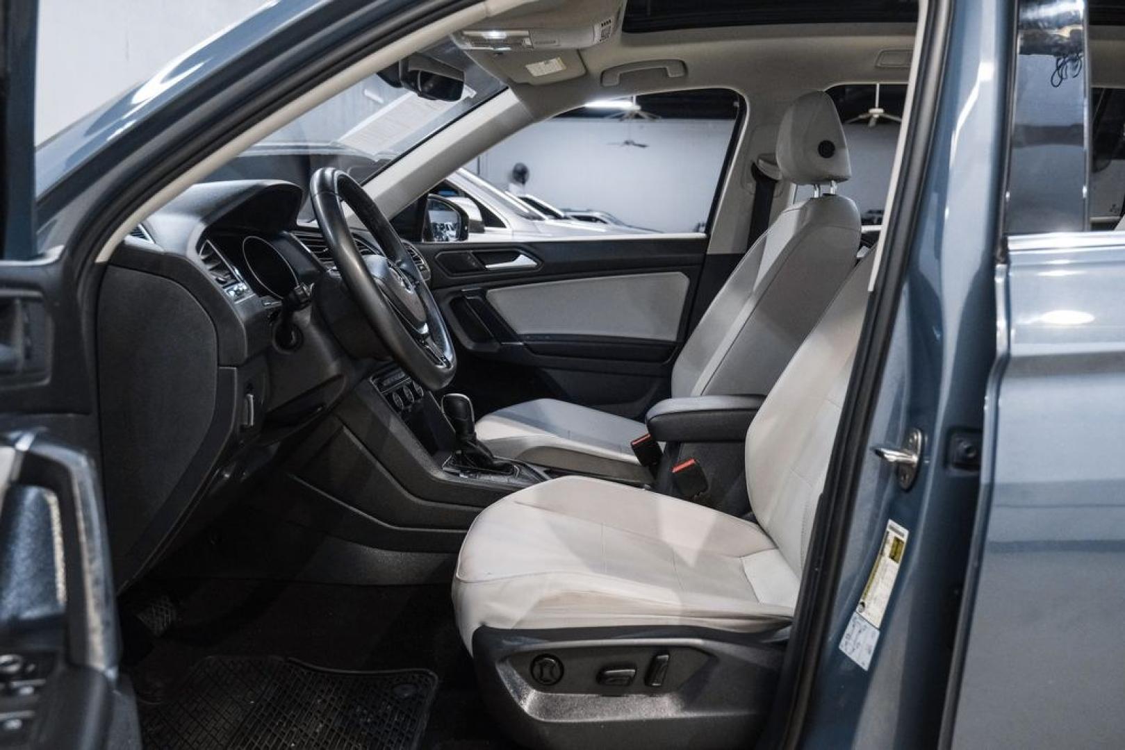 2020 Blue Metallic /Storm Gray Volkswagen Tiguan 2.0T SE (3VV3B7AX0LM) with an 2.0L TSI DOHC engine, Automatic transmission, located at 15300 Midway Rd., Addison, TX, 75001, (972) 702-0011, 32.958321, -96.838074- Photo#3