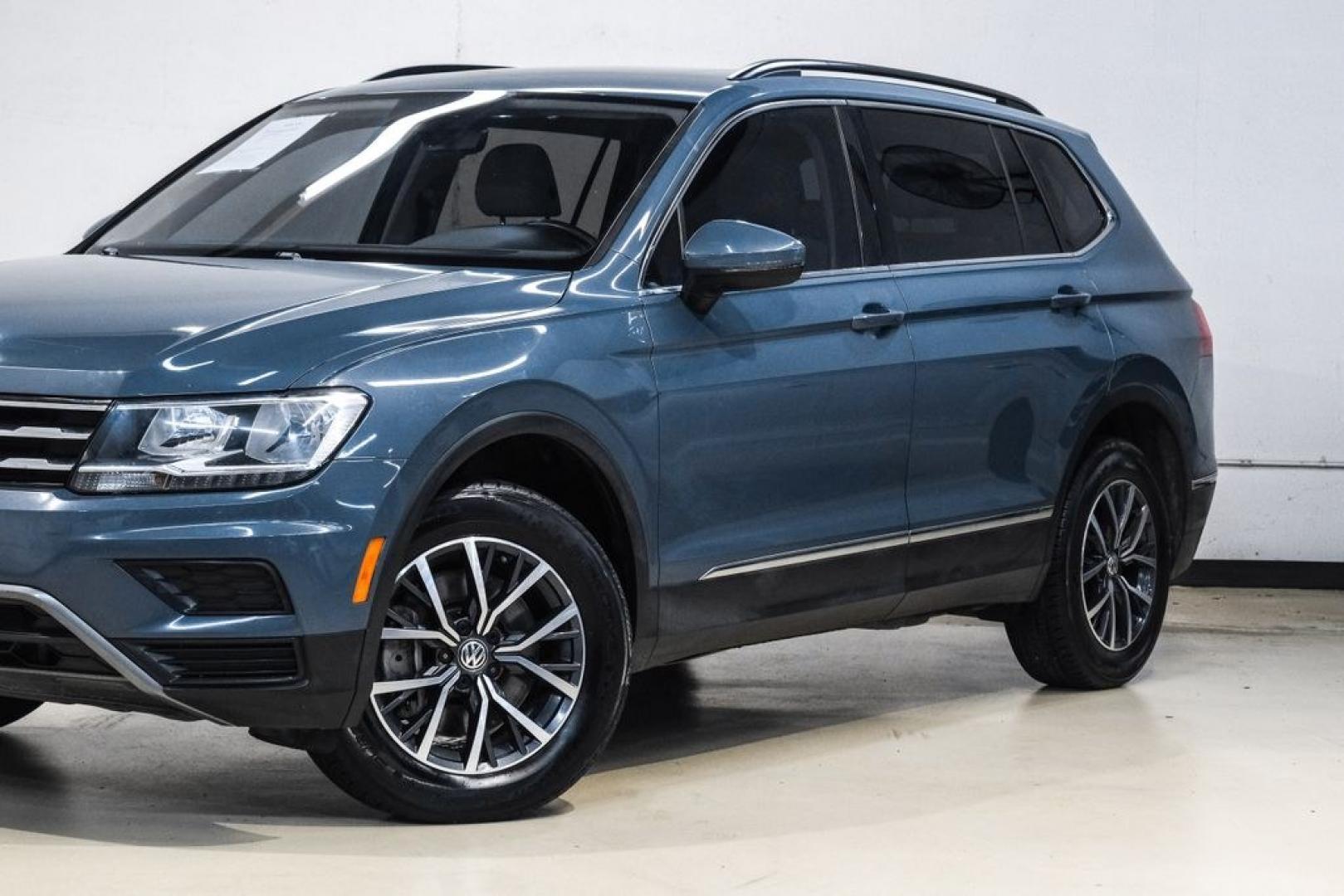 2020 Blue Metallic /Storm Gray Volkswagen Tiguan 2.0T SE (3VV3B7AX0LM) with an 2.0L TSI DOHC engine, Automatic transmission, located at 15300 Midway Rd., Addison, TX, 75001, (972) 702-0011, 32.958321, -96.838074- Photo#6