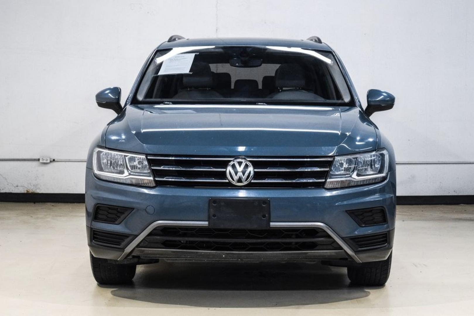2020 Blue Metallic /Storm Gray Volkswagen Tiguan 2.0T SE (3VV3B7AX0LM) with an 2.0L TSI DOHC engine, Automatic transmission, located at 15300 Midway Rd., Addison, TX, 75001, (972) 702-0011, 32.958321, -96.838074- Photo#7