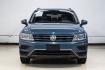 2020 Blue Metallic /Storm Gray Volkswagen Tiguan 2.0T SE (3VV3B7AX0LM) with an 2.0L TSI DOHC engine, Automatic transmission, located at 15300 Midway Rd., Addison, TX, 75001, (972) 702-0011, 32.958321, -96.838074- Photo#7