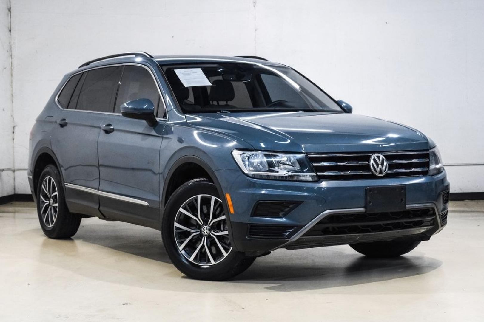 2020 Blue Metallic /Storm Gray Volkswagen Tiguan 2.0T SE (3VV3B7AX0LM) with an 2.0L TSI DOHC engine, Automatic transmission, located at 15300 Midway Rd., Addison, TX, 75001, (972) 702-0011, 32.958321, -96.838074- Photo#8