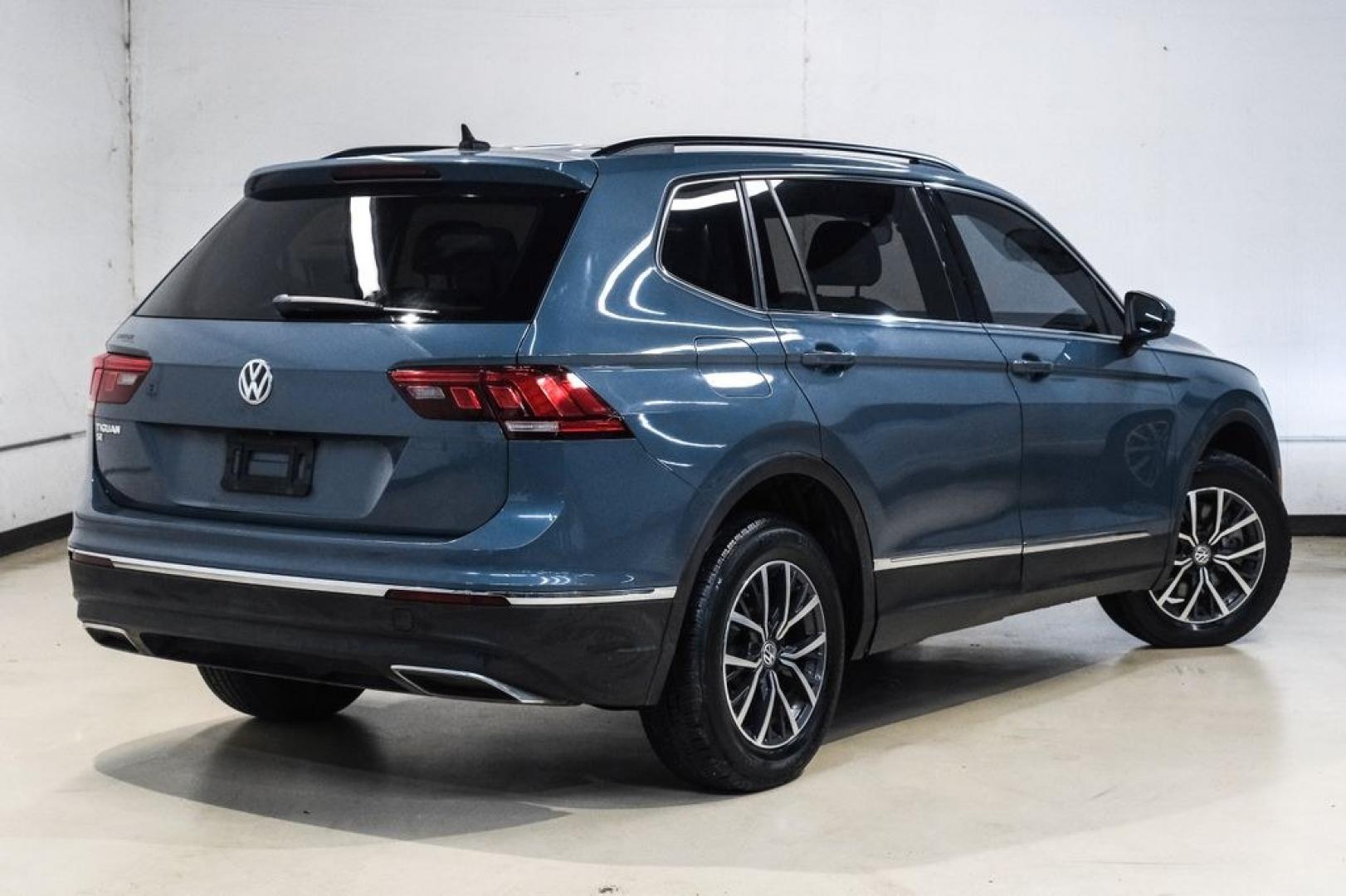 2020 Blue Metallic /Storm Gray Volkswagen Tiguan 2.0T SE (3VV3B7AX0LM) with an 2.0L TSI DOHC engine, Automatic transmission, located at 15300 Midway Rd., Addison, TX, 75001, (972) 702-0011, 32.958321, -96.838074- Photo#10