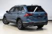 2020 Blue Metallic /Storm Gray Volkswagen Tiguan 2.0T SE (3VV3B7AX0LM) with an 2.0L TSI DOHC engine, Automatic transmission, located at 15300 Midway Rd., Addison, TX, 75001, (972) 702-0011, 32.958321, -96.838074- Photo#12