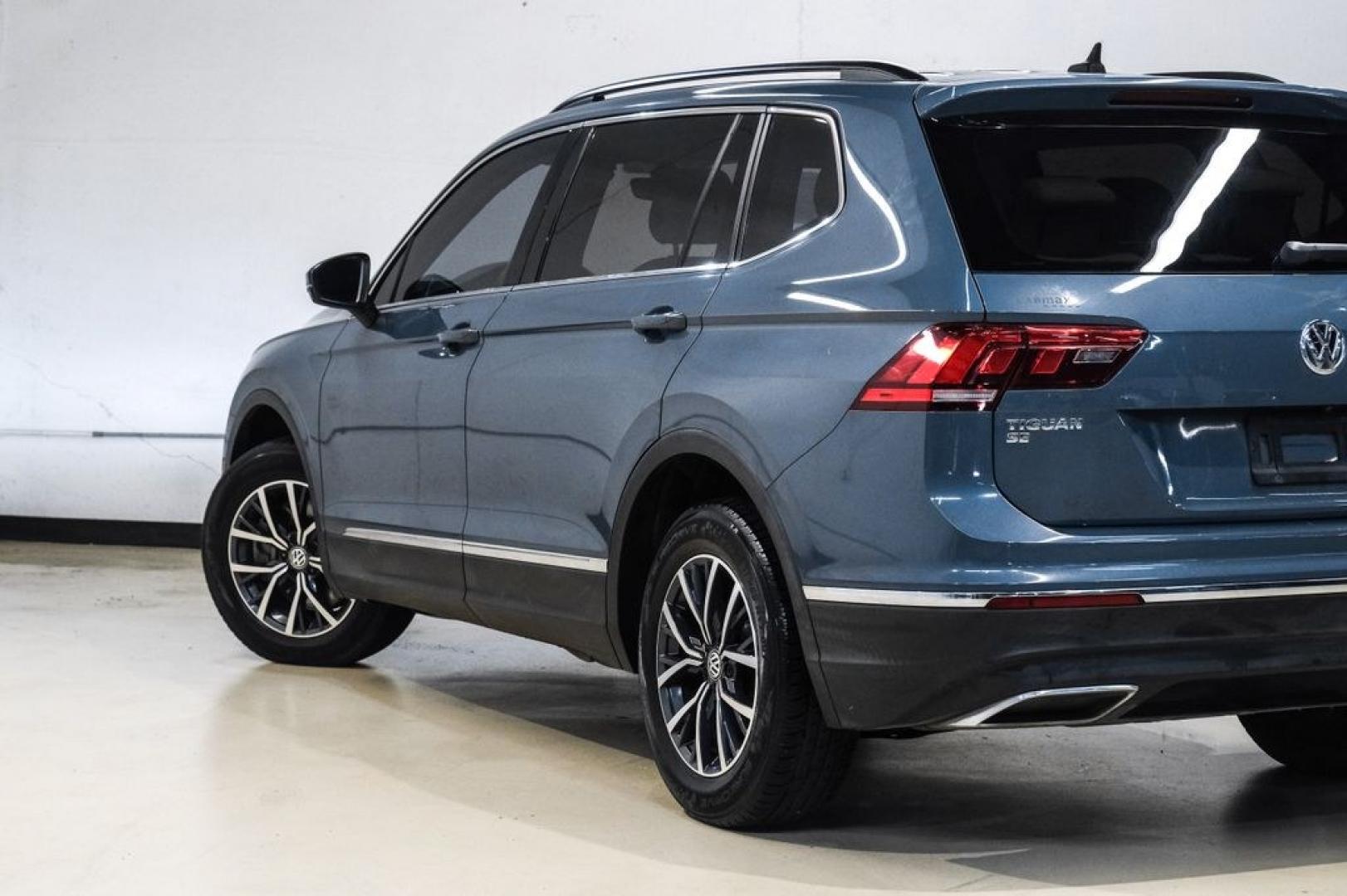 2020 Blue Metallic /Storm Gray Volkswagen Tiguan 2.0T SE (3VV3B7AX0LM) with an 2.0L TSI DOHC engine, Automatic transmission, located at 15300 Midway Rd., Addison, TX, 75001, (972) 702-0011, 32.958321, -96.838074- Photo#13