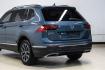 2020 Blue Metallic /Storm Gray Volkswagen Tiguan 2.0T SE (3VV3B7AX0LM) with an 2.0L TSI DOHC engine, Automatic transmission, located at 15300 Midway Rd., Addison, TX, 75001, (972) 702-0011, 32.958321, -96.838074- Photo#14