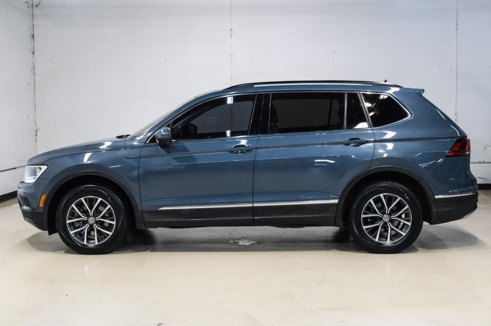 2020 Blue Metallic /Storm Gray Volkswagen Tiguan 2.0T SE (3VV3B7AX0LM) with an 2.0L TSI DOHC engine, Automatic transmission, located at 15300 Midway Rd., Addison, TX, 75001, (972) 702-0011, 32.958321, -96.838074- Photo#15