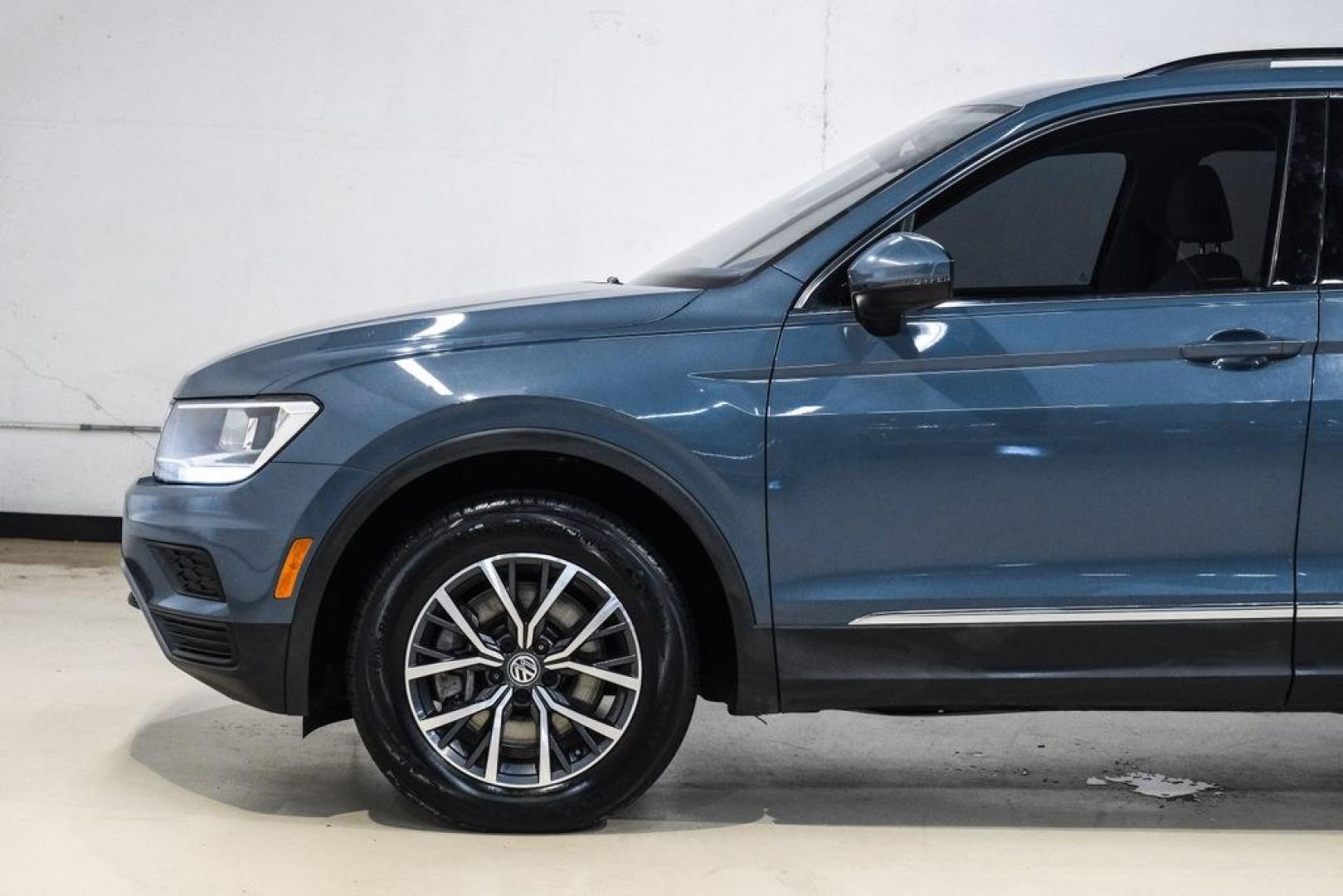 2020 Blue Metallic /Storm Gray Volkswagen Tiguan 2.0T SE (3VV3B7AX0LM) with an 2.0L TSI DOHC engine, Automatic transmission, located at 15300 Midway Rd., Addison, TX, 75001, (972) 702-0011, 32.958321, -96.838074- Photo#16