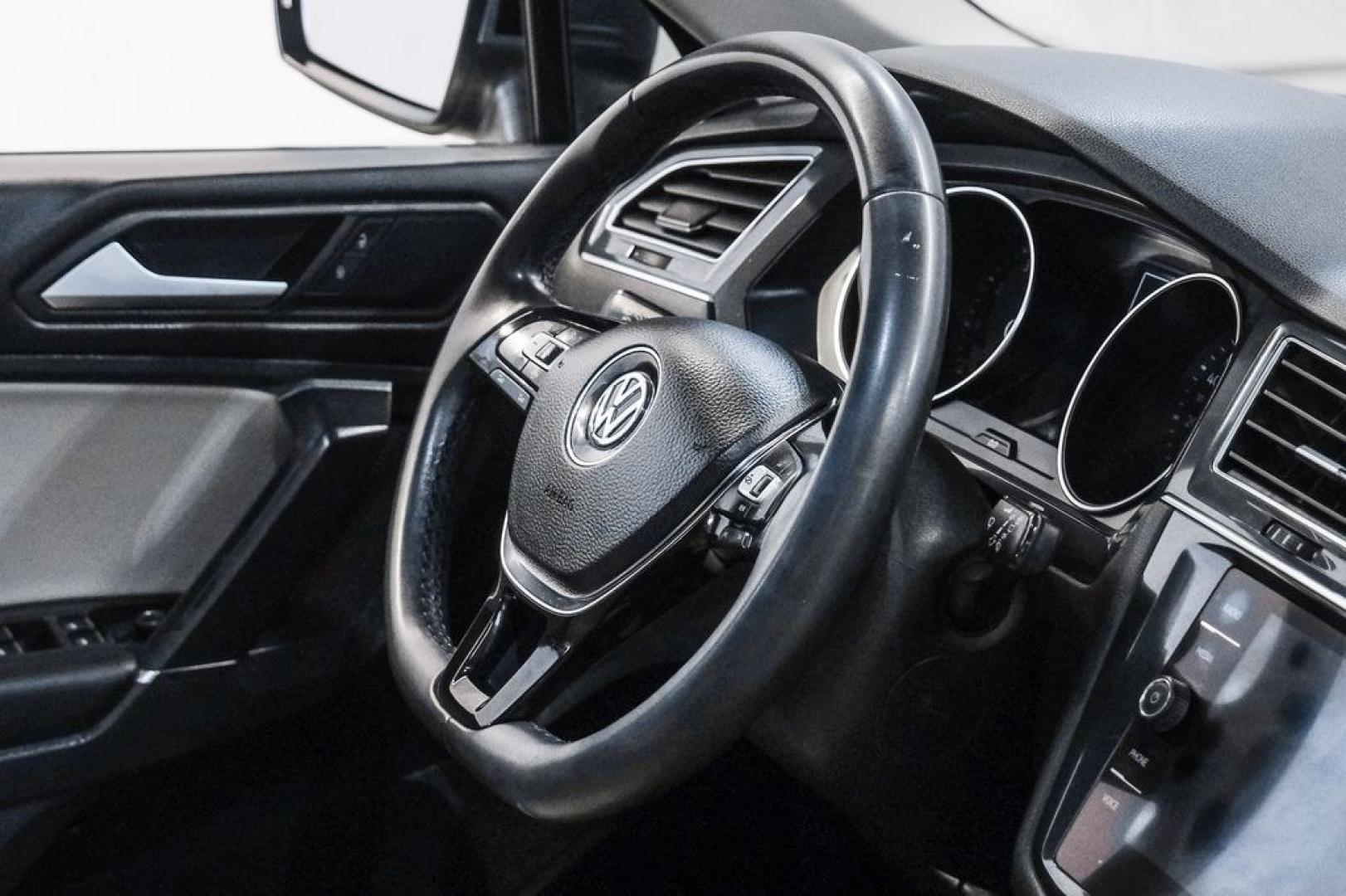 2020 Blue Metallic /Storm Gray Volkswagen Tiguan 2.0T SE (3VV3B7AX0LM) with an 2.0L TSI DOHC engine, Automatic transmission, located at 15300 Midway Rd., Addison, TX, 75001, (972) 702-0011, 32.958321, -96.838074- Photo#20