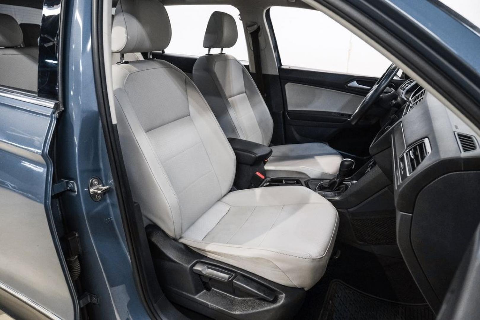 2020 Blue Metallic /Storm Gray Volkswagen Tiguan 2.0T SE (3VV3B7AX0LM) with an 2.0L TSI DOHC engine, Automatic transmission, located at 15300 Midway Rd., Addison, TX, 75001, (972) 702-0011, 32.958321, -96.838074- Photo#31