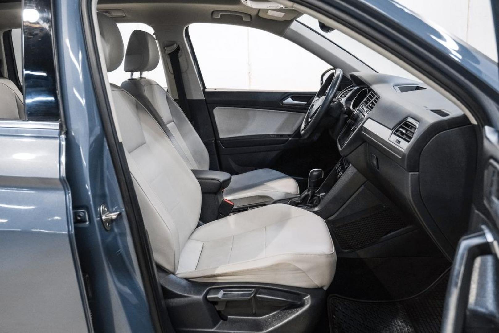 2020 Blue Metallic /Storm Gray Volkswagen Tiguan 2.0T SE (3VV3B7AX0LM) with an 2.0L TSI DOHC engine, Automatic transmission, located at 15300 Midway Rd., Addison, TX, 75001, (972) 702-0011, 32.958321, -96.838074- Photo#32