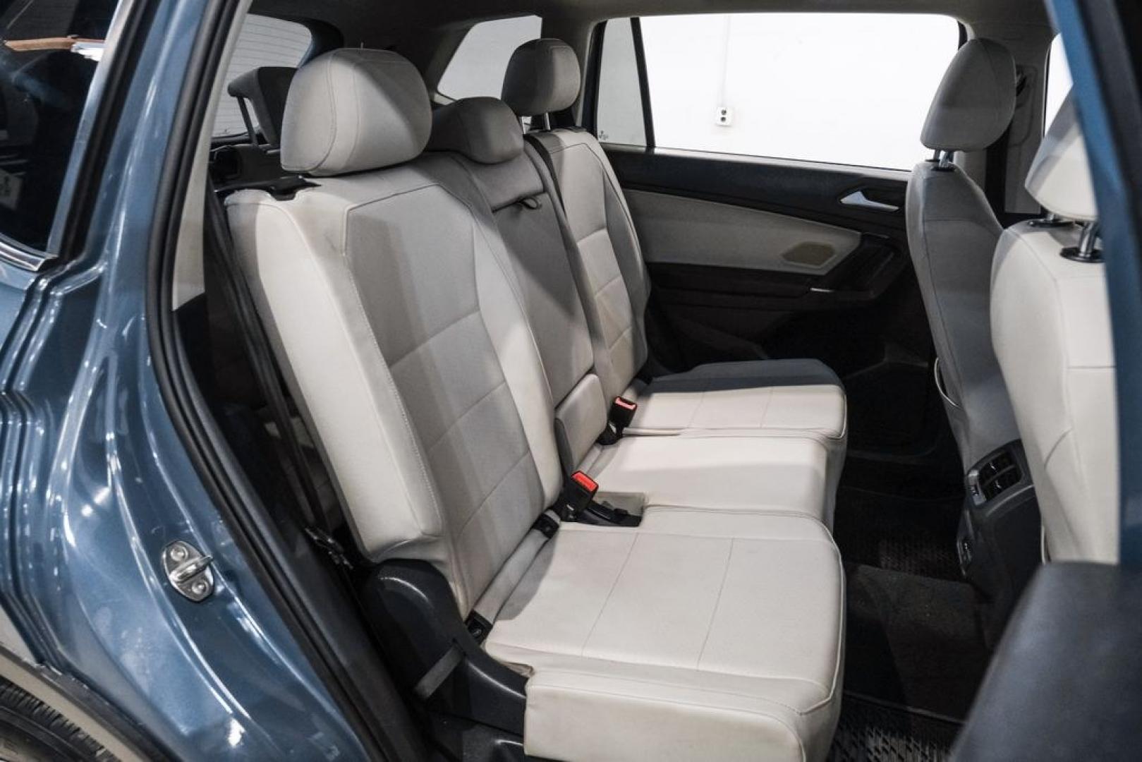 2020 Blue Metallic /Storm Gray Volkswagen Tiguan 2.0T SE (3VV3B7AX0LM) with an 2.0L TSI DOHC engine, Automatic transmission, located at 15300 Midway Rd., Addison, TX, 75001, (972) 702-0011, 32.958321, -96.838074- Photo#33