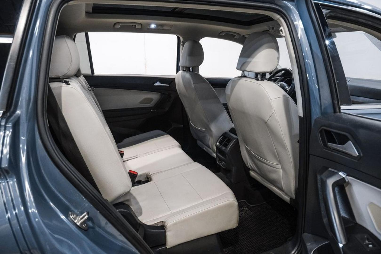 2020 Blue Metallic /Storm Gray Volkswagen Tiguan 2.0T SE (3VV3B7AX0LM) with an 2.0L TSI DOHC engine, Automatic transmission, located at 15300 Midway Rd., Addison, TX, 75001, (972) 702-0011, 32.958321, -96.838074- Photo#34