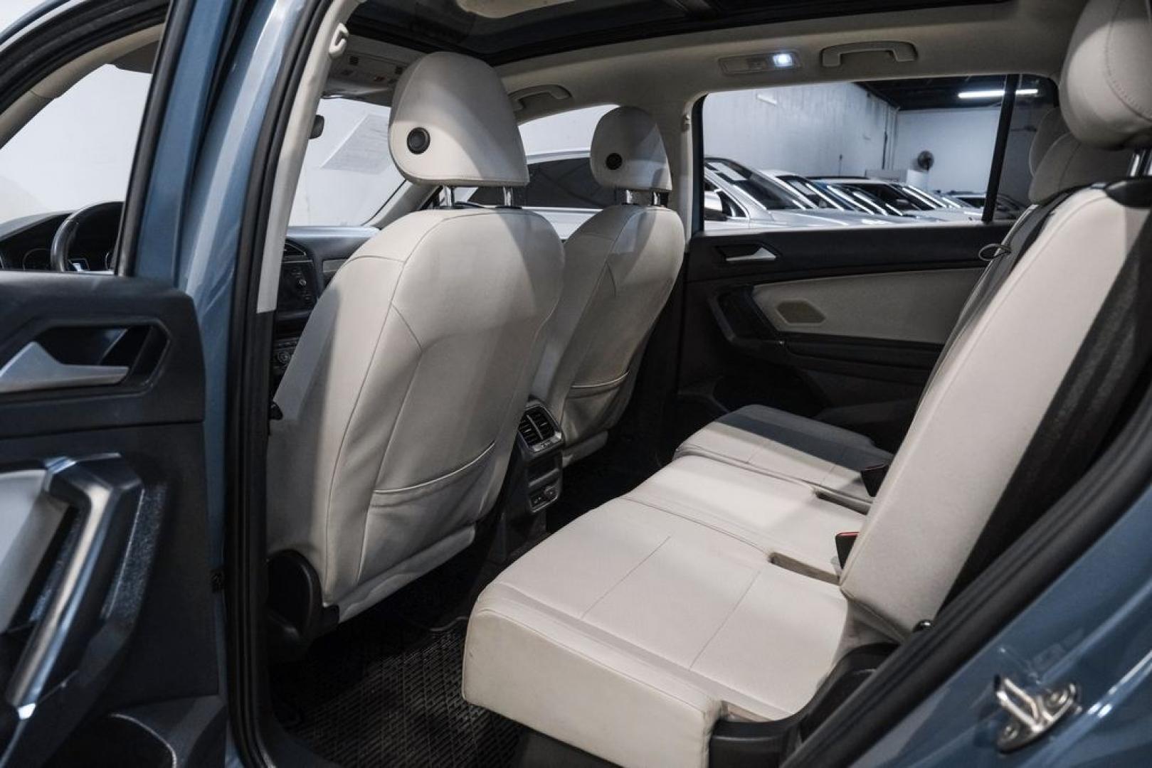 2020 Blue Metallic /Storm Gray Volkswagen Tiguan 2.0T SE (3VV3B7AX0LM) with an 2.0L TSI DOHC engine, Automatic transmission, located at 15300 Midway Rd., Addison, TX, 75001, (972) 702-0011, 32.958321, -96.838074- Photo#36